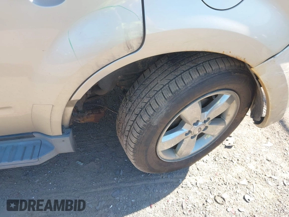 2010 Ford Escape Limited with VIN 1FMCU9EG6AKC60870, listed as a IAAI auction lot 42769384 with 83,839 mi miles and . Bid and sale history available at DreamBid. Image 6.
