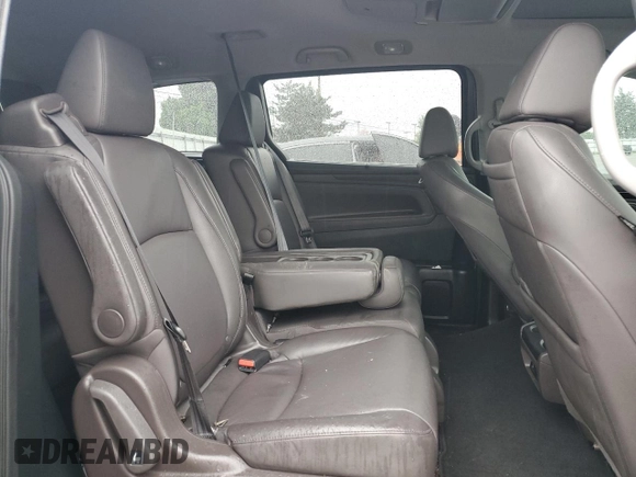 2018 Honda Odyssey Elite z VIN 5FNRL6H94JB107589, wystawiony jako Copart lot #58347385 z przebiegiem 98 761 mil mil oraz Szkoda całkowita • Salvage title. Historia ofert i sprzedaży dostępna na DreamBid. Obrazek 11.