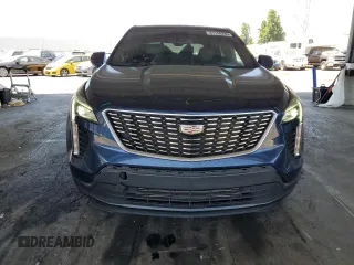 2022 Cadillac XT4 FWD Luxury с VIN 1GYAZAR40NF120224, выставлен на аукционе Copart как лот 61100285 с пробегом 35 260 миль миль и Списание • Salvage title. История ставок и продаж доступна на DreamBid. Изображение 5.