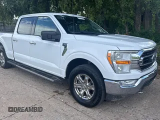 2021 Ford F-150 XL with VIN 1FTFW1E87MFC81620, listed as a Copart auction lot 63874525 with 166,409 mi miles and Clean title. Bid and sale history available at DreamBid. Image 1.