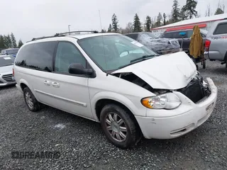 2005 Chrysler Town & Country Touring with VIN 2C4GP54L25R395372, listed as a IAAI auction lot 41805284 with 143,431 mi miles. Bid and sale history available at carsss.com. Image 13.