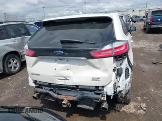 2019 Ford Edge SEL with VIN 2FMPK4J93KBB78771, listed as a IAAI auction lot 42159093 with 80,510 mi miles and . Bid and sale history available at DreamBid. Image 16.