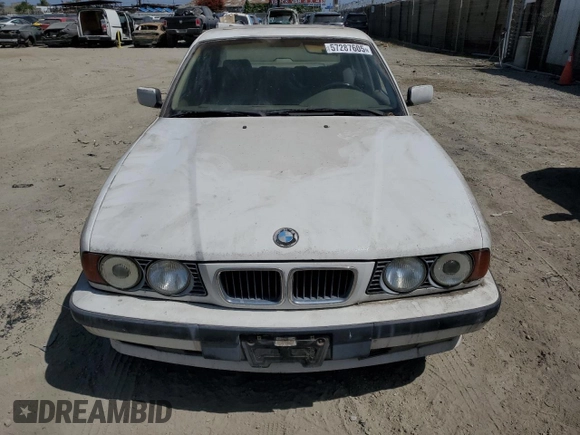 1995 BMW 5 Series 525i z VIN WBAHD6324SGK57242, wystawiony jako Copart lot #57287605 z przebiegiem Nie podano mil oraz Czysty tytuł • Clean title. Historia ofert i sprzedaży dostępna na DreamBid. Obrazek 5.