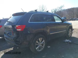2013 Jeep Grand Cherokee Laredo with VIN 1C4RJFAG4DC653079, listed as a IAAI auction lot 41726726 with 152,356 mi miles. Bid and sale history available at carsss.com. Image 4.