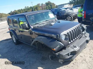 2020 Jeep Wrangler Unlimited Sport S z VIN 1C4HJXDG1LW237405, wystawiony jako IAAI lot #40631451 z przebiegiem 60 256 mil mil oraz . Historia ofert i sprzedaży dostępna na DreamBid. Obrazek 1.