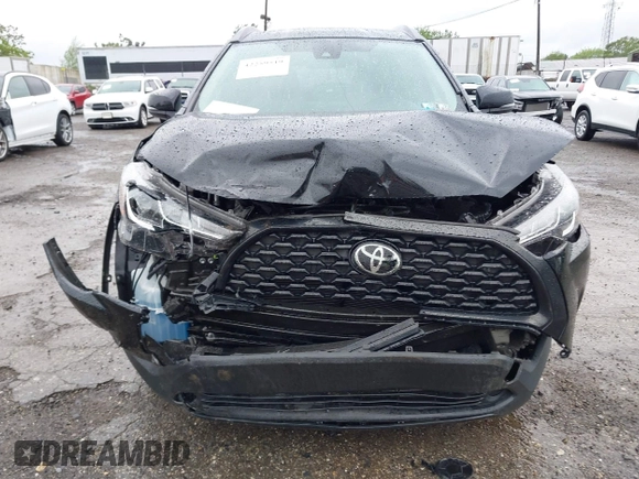 2022 Toyota Corolla Cross LE with VIN 7MUCAABG8NV004527, listed as a IAAI auction lot 42259519 with 15,211 mi miles and . Bid and sale history available at DreamBid. Image 11.