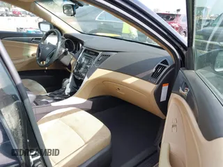 2012 Hyundai Sonata Hybrid z VIN KMHEC4A44CA024933, wystawiony jako IAAI lot #42257317 z przebiegiem 134 148 mil mil oraz . Historia ofert i sprzedaży dostępna na DreamBid. Obrazek 5.