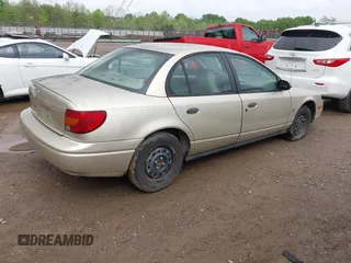 2000 Saturn SL with VIN 1G8ZH5287YZ262924, listed as a IAAI auction lot 42068691 with 161,975 mi miles and . Bid and sale history available at DreamBid. Image 4.