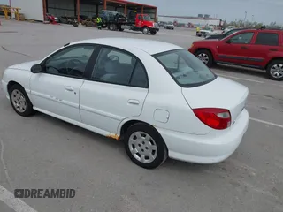 2002 Kia Rio with VIN KNADC123926185376, listed as a IAAI auction lot 42027348 with 84,893 mi miles. Bid and sale history available at carsss.com. Image 3.