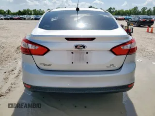 2013 Ford Focus SE with VIN 1FADP3F22DL263124, listed as a Copart auction lot 61583795 with 133,522 mi miles and Salvage title. Bid and sale history available at DreamBid. Image 6.