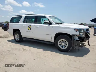 2019 Chevrolet Suburban with VIN 1GNSCKEC9KR230768, listed as a Copart auction lot 58822915 with 96,823 mi miles and Salvage title. Bid and sale history available at DreamBid. Image 4.