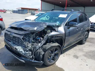 2021 Toyota RAV4 Hybrid XSE with VIN 2T3E6RFV8MW026973, listed as a IAAI auction lot 42052289 with 94,857 mi miles and . Bid and sale history available at DreamBid. Image 18.