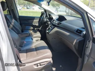 2011 Honda Odyssey EX-L with VIN 5FNRL5H62BB075789, listed as a IAAI auction lot 42035746 with 238,616 mi miles and . Bid and sale history available at carsss.com. Image 5.
