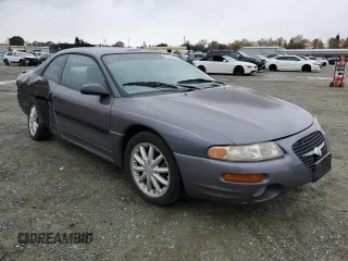 1997 Chrysler Sebring LXi z VIN 4C3AU52N2VE183090, wystawiony jako Copart lot #81855454 z przebiegiem 157 590 mil mil oraz Szkoda całkowita • Salvage title. Historia ofert i sprzedaży dostępna na DreamBid. Obrazek 4.
