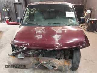 2004 Ford Econoline Cargo with VIN 1FTRE14WX4HA29431, listed as a IAAI auction lot 41651440 with 247,750 mi miles. Bid and sale history available at carsss.com. Image 12.