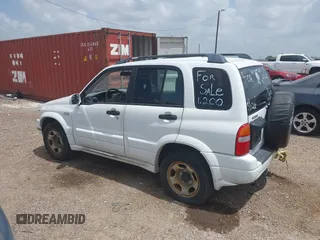2002 Suzuki Grand Vitara JS z VIN JS3TE62VX24154819, wystawiony jako IAAI lot #42409780 z przebiegiem 160 545 mil mil oraz . Historia ofert i sprzedaży dostępna na DreamBid. Obrazek 3.