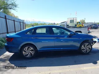 2021 Volkswagen Jetta SEL with VIN 3VWE57BUXMM050386, listed as a IAAI auction lot 42140492 with 74,477 mi miles and . Bid and sale history available at DreamBid. Image 14.