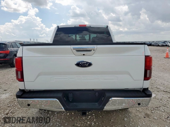 2020 Ford F-150 XL with VIN 1FTEW1C40LKE64326, listed as a Copart auction lot 63694335 with 42,376 mi miles and Salvage title. Bid and sale history available at DreamBid. Image 6.