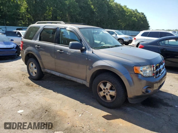 2009 Ford Escape XLS with VIN 1FMCU02749KA36136, listed as a Copart auction lot 64941875 with 171,576 mi miles and Clean title. Bid and sale history available at DreamBid. Image 4.