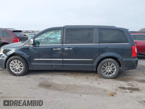 2014 Chrysler Town & Country Touring L 30th Anniversary z VIN 2C4RC1CG4ER133192, wystawiony jako IAAI lot #41113205 z przebiegiem 191 964 mil mil oraz . Historia ofert i sprzedaży dostępna na DreamBid. Obrazek 14.