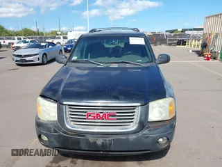 2002 GMC Envoy SLE z VIN 1GKDS13S922523317, wystawiony jako IAAI lot #42374259 z przebiegiem 185 686 mil mil oraz . Historia ofert i sprzedaży dostępna na DreamBid. Obrazek 6.