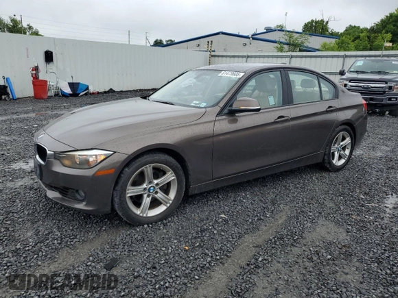 2014 BMW 3 Series 328i with VIN WBA3C1C59EK112967, listed as a Copart auction lot 61473605 with 151,905 mi miles and Clean title. Bid and sale history available at DreamBid. Image 1.