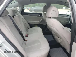 2015 Hyundai Sonata SE z VIN 5NPE24AF9FH106131, wystawiony jako Copart lot #57425605 z przebiegiem 124 668 mil mil oraz Czysty tytuł • Clean title. Historia ofert i sprzedaży dostępna na DreamBid. Obrazek 10.