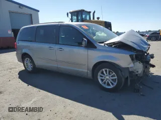 2014 Dodge Grand Caravan SXT with VIN 2C4RDGCG4ER478657, listed as a Copart auction lot 55691085 with 139,681 mi miles and Salvage Title. Bid and sale history available at DreamBid. Image 4.