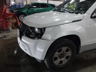 2011 Suzuki Grand Vitara Premium z VIN JS3TD0D24B4101861, wystawiony jako IAAI lot #41620401 z przebiegiem 151 034 mil mil oraz . Historia ofert i sprzedaży dostępna na DreamBid. Obrazek 6.