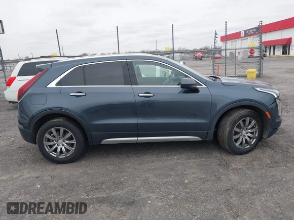 2020 Cadillac XT4 AWD Premium Luxury with VIN 1GYFZDR45LF062180, listed as a IAAI auction lot 41599215 with 105,350 mi miles. Bid and sale history available at carsss.com. Image 13.