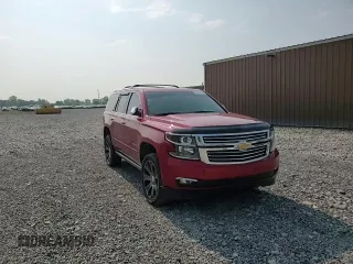 2015 Chevrolet Tahoe LTZ z VIN 1GNSKCKC4FR277564, wystawiony jako Copart lot #60589335 z przebiegiem Nie podano mil oraz Szkoda całkowita • Salvage title. Historia ofert i sprzedaży dostępna na DreamBid. Obrazek 14.
