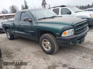 2000 Dodge Dakota Sport with VIN 1B7GL22N6YS764185, listed as a IAAI auction lot 41570275 with 157,334 mi miles. Bid and sale history available at carsss.com. Image 1.