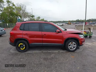 2015 Volkswagen Tiguan R-Line with VIN WVGAV7AXXFW106001, listed as a IAAI auction lot 41652896 with 131,031 mi miles and . Bid and sale history available at DreamBid. Image 14.