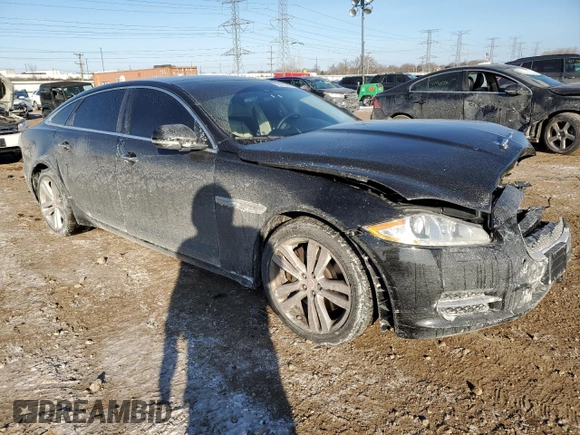 2014 Jaguar XJ Portfolio with VIN SAJWJ2GD6E8V73491, listed as a Copart auction lot 42472345 with 68,747 mi miles and Salvage title. Bid and sale history available at DreamBid. Image 4.