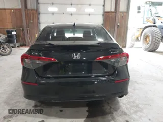 2023 Honda Civic Sport with VIN 2HGFE2F52PH505538, listed as a IAAI auction lot 42447559 with 36,621 mi miles and . Bid and sale history available at DreamBid. Image 16.