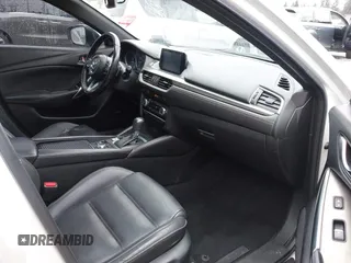 2017 Mazda 6 Grand Touring with VIN JM1GL1X51H1142473, listed as a IAAI auction lot 42234809 with 101,633 mi miles and . Bid and sale history available at DreamBid. Image 5.