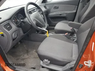 2009 Kia Rio LX with VIN KNADE243396530327, listed as a Copart auction lot 44631785 with 123,170 mi miles and Salvage Title. Bid and sale history available at carsss.com. Image 7.