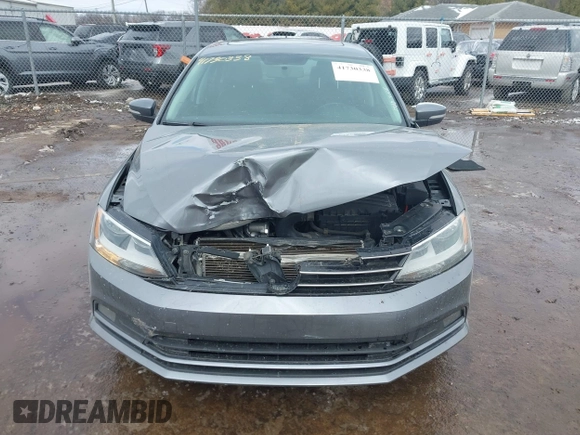 2015 Volkswagen Jetta Sedan 1.8T SE w/Connectivity with VIN 3VWD07AJ8FM260537, listed as a IAAI auction lot 41730338 with 155,724 mi miles. Bid and sale history available at carsss.com. Image 12.