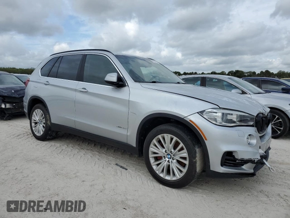 2015 BMW X5 xDrive50i with VIN 5UXKR6C51F0J74160, listed as a Copart auction lot 79337044 with 143,436 mi miles and Salvage title. Bid and sale history available at DreamBid. Image 4.