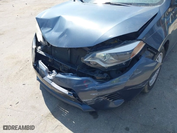 2016 Toyota Corolla L with VIN 5YFBURHE6GP556122, listed as a IAAI auction lot 41885959 with 210,711 mi miles. Bid and sale history available at carsss.com. Image 6.