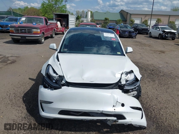 2022 Tesla Model 3 Long Range z VIN 5YJ3E1EB4NF183832, wystawiony jako IAAI lot #42085815 z przebiegiem 35 880 mil mil oraz . Historia ofert i sprzedaży dostępna na DreamBid. Obrazek 12.