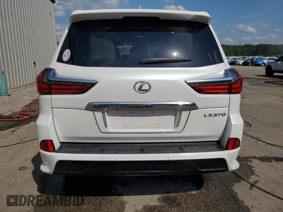 2020 Lexus LX 570 with VIN JTJDY7AX6L4332372, listed as a Copart auction lot 57315675 with 132,418 mi miles and Salvage title. Bid and sale history available at DreamBid. Image 6.