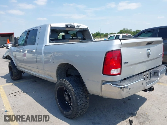2015 Ram 2500 SLT with VIN 3C6UR5ML9FG611388, listed as a IAAI auction lot 42045503 with 164,547 mi miles and . Bid and sale history available at DreamBid. Image 3.