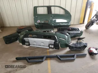 2023 Nissan Frontier Pro-4X z VIN 1N6ED1EK4PN671708, wystawiony jako Copart lot #58271305 z przebiegiem 22 906 mil mil oraz Szkoda całkowita • Salvage title. Historia ofert i sprzedaży dostępna na DreamBid. Obrazek 12.