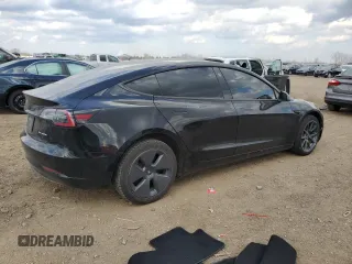 2022 Tesla Model 3 Long Range z VIN 5YJ3E1EB9NF134819, wystawiony jako Copart lot #49639365 z przebiegiem 49 245 mil mil oraz Szkoda całkowita • Salvage title. Historia ofert i sprzedaży dostępna na DreamBid. Obrazek 3.