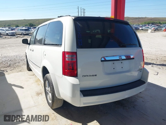 2010 Dodge Grand Caravan SXT with VIN 2D4RN5D1XAR462150, listed as a IAAI auction lot 41466381 with 204,531 mi miles and . Bid and sale history available at DreamBid. Image 3.