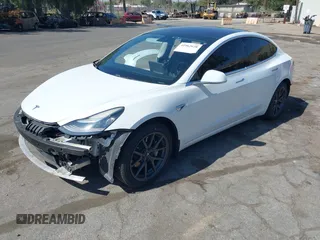 2018 Tesla Model 3 Long Range Battery with VIN 5YJ3E1EAXJF108781, listed as a IAAI auction lot 41962628 with 61,208 mi miles and . Bid and sale history available at DreamBid. Image 23.