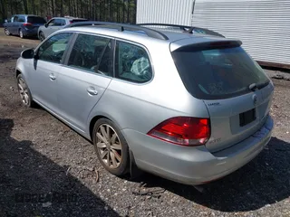 2013 Volkswagen Jetta SportWagen S with VIN 3VWPP7AJ2DM693289, listed as a IAAI auction lot 41859724 with 124,096 mi miles. Bid and sale history available at carsss.com. Image 3.