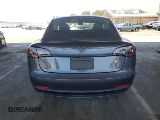 2023 Tesla Model 3 with VIN 5YJ3E1EA4PF456228, listed as a Copart auction lot 61442085 with 121,173 mi miles and Clean title. Bid and sale history available at DreamBid. Image 6.