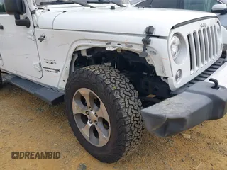 2018 Jeep Wrangler Unlimited Altitude with VIN 1C4HJWEGXJL870606, listed as a IAAI auction lot 42693031 with 92,735 mi miles and . Bid and sale history available at DreamBid. Image 6.